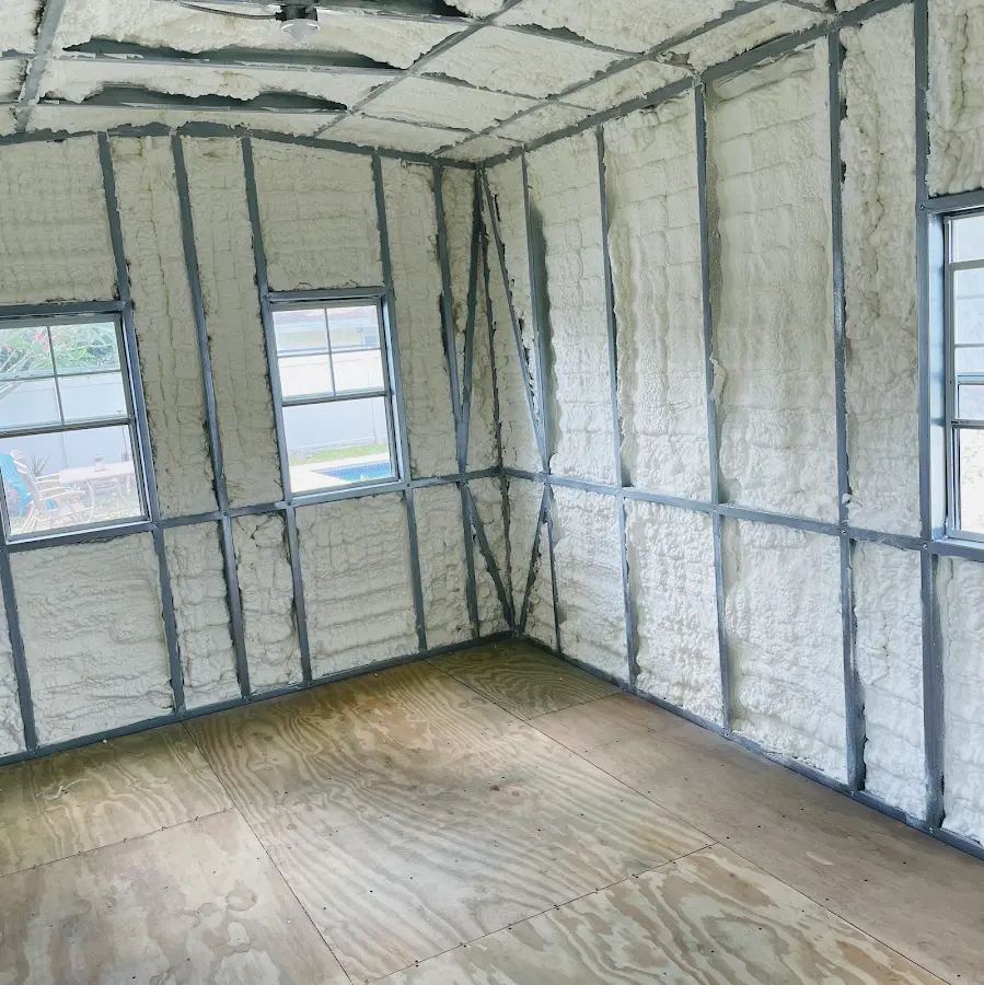 Closed-cell spray foam insulation applied to wall cavities in a residential project in Silver Spring